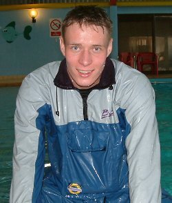 pool lifeguard swimming in uniform clothes