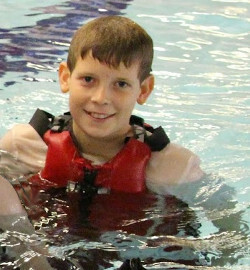 pool lifeguard swimming in uniform clothes